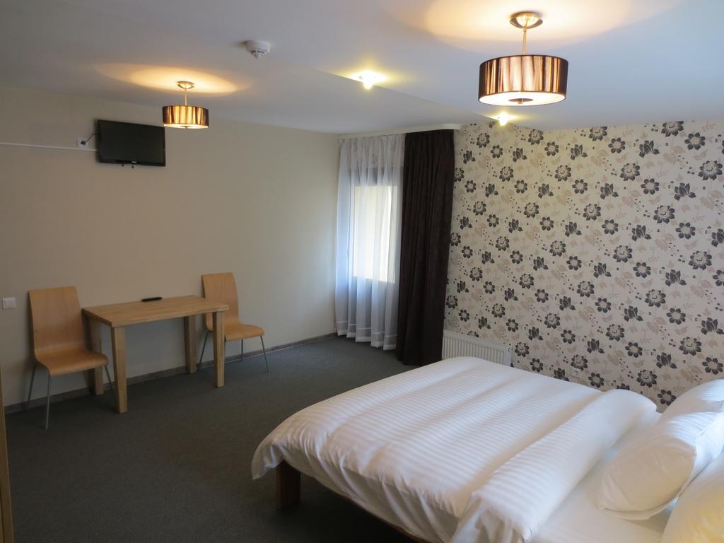 Amigo Hotel Рига Стая снимка